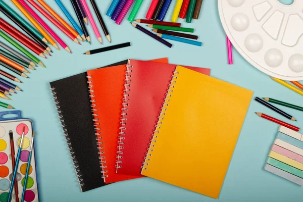 Multicolored Notebooks Black Red Orange Pink Background Copy Space Text — Fotografia de Stock