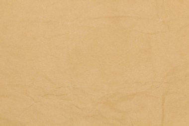Bej kağıt dokusu. Soyut arkaplan. Pürüzsüz kahverengi ambalaj kağıdı. Metin için alanı kopyala