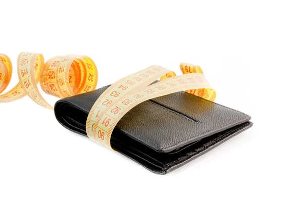 Black wallet with yellow tape measure — Stock Photo, Image