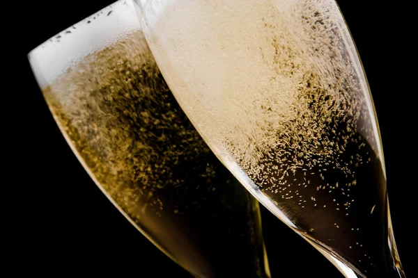 Two flutes with champagne gold bubbles — Stock Photo, Image