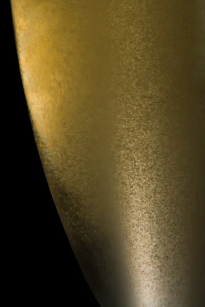 Halbe Champagnerflöte mit goldenen Blasen — Stockfoto