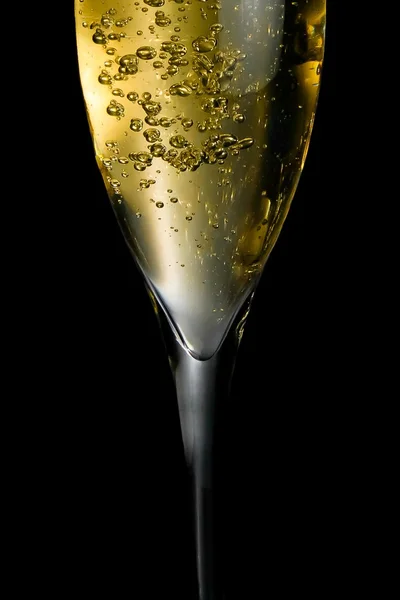 Champagne flute with golden fine bubbles — Stock Photo, Image