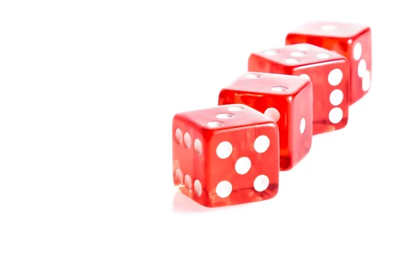 Four red dice in a row — Stock Photo, Image