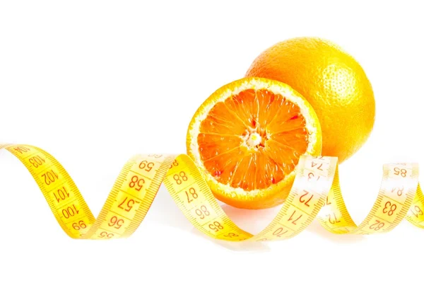 One orange and half orange with tape measure — Stock Photo, Image