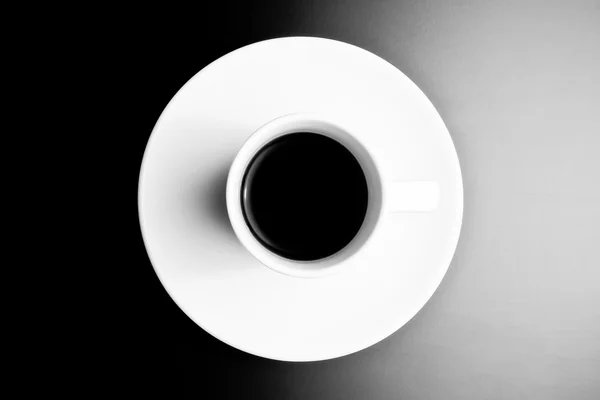 Black and white symmetry, top view of cup of black coffee — Stok Foto