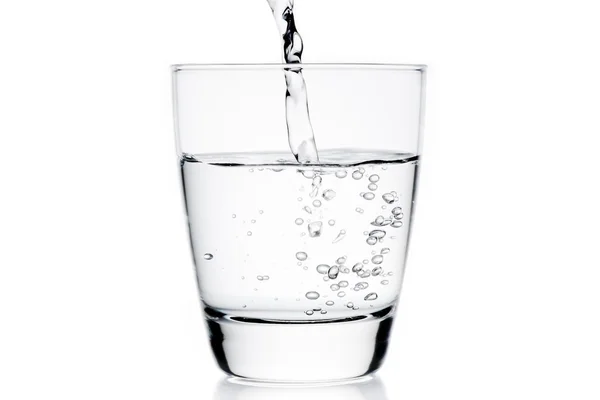 Glass with pure water and bubbles — Stock Photo, Image