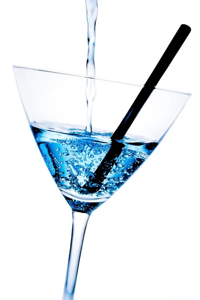 Detail of blue cocktail with bubbles and black straw — Stock Photo, Image