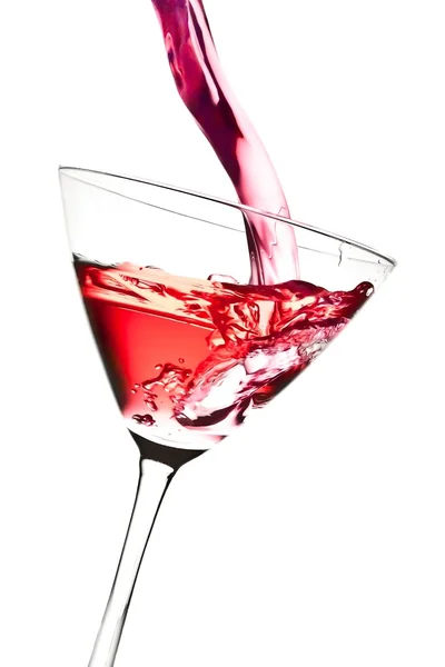 用红色鸡尾酒倾斜和泡沫填充玻璃 — 图库照片