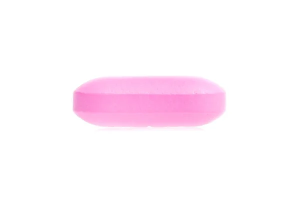 One pink medical pill isolated — Stock Photo, Image