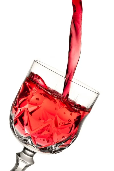 Vino tinto vertiendo en el vaso — Foto de Stock