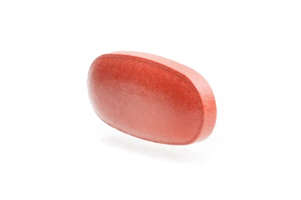 Red medical pill isolated — Stock Photo, Image