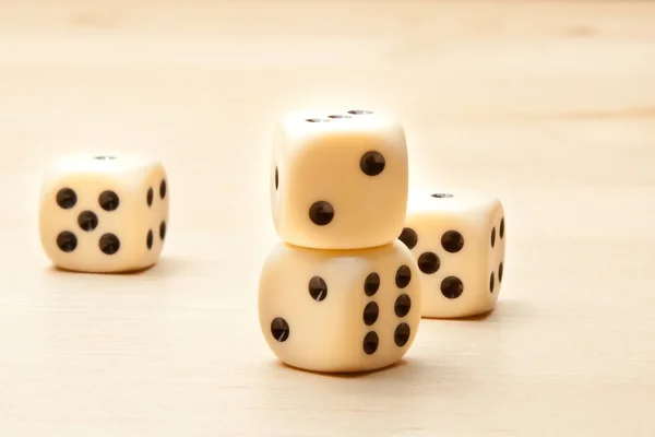 Dice on wood table — Stock Photo, Image