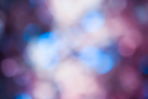 Abstracte blauw en violet circulaire bokeh achtergrond — Stockfoto