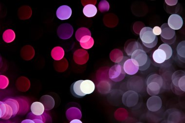pembe, kırmızı veya mor yuvarlak bokeh arka plan
