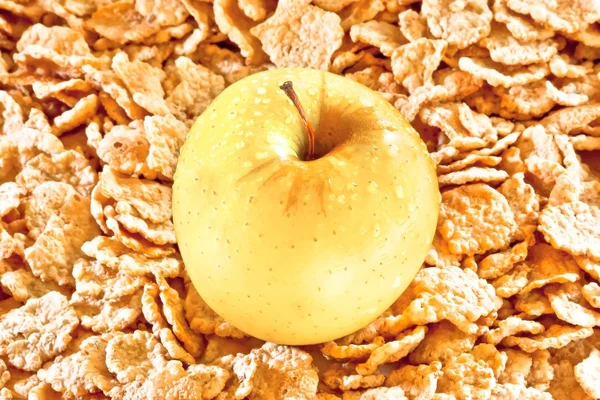 Žluté jablko a Kukuřičné vločky, dieta koncepce — Stock fotografie