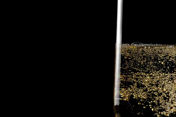 Flute of champagne with golden bubbles — Stock Photo, Image