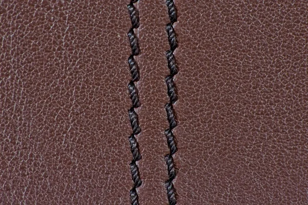 Brown leather texture with black stitching — Stock Photo, Image