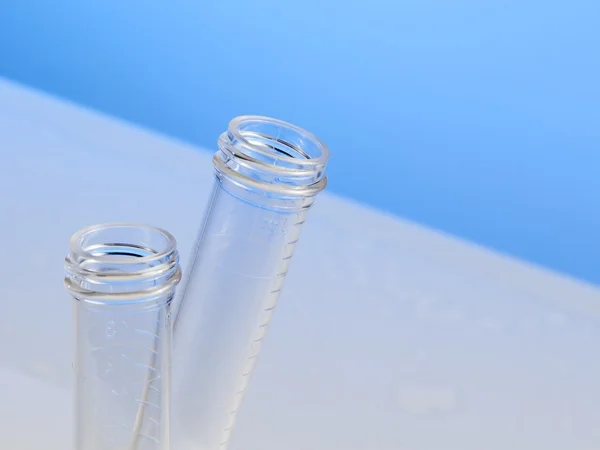 Test tubes in laboratory on table — Stock Photo, Image