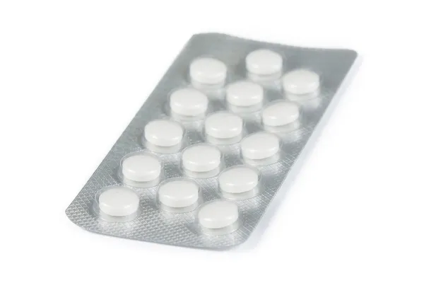 White pills packed in blister isolated — Stock Photo, Image