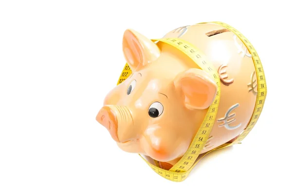 Porquinho banco e fita métrica, conceito para o negócio e economizar dinheiro — Fotografia de Stock