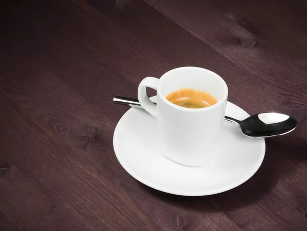Una taza de café espresso italiano con cuchara —  Fotos de Stock