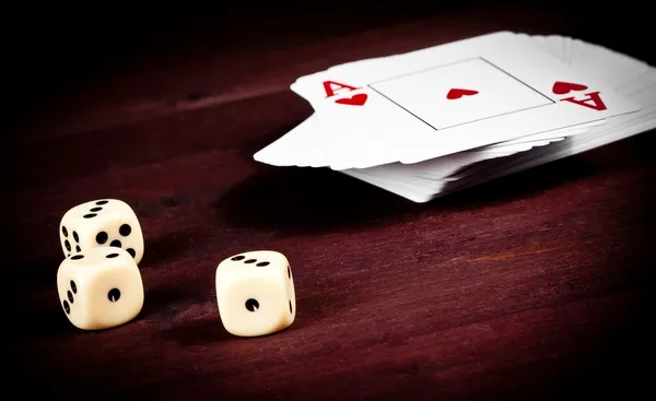 Dice near playing card, concept of poker game texas — Stock Photo, Image