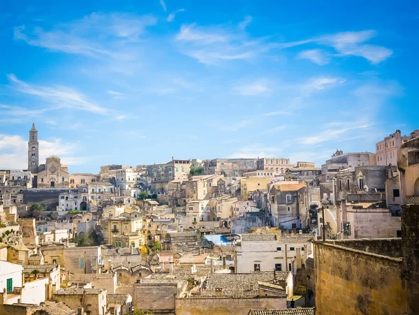 Panoramic view of stones of Matera under blue sky — Stock Photo, Image