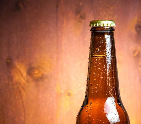 Bottle of fresh beer with drops, with space for text — 스톡 사진