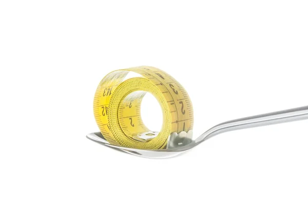 Kaşık, beslenme ve diyet kavramı üzerinde ölçüm bandı — Stok fotoğraf