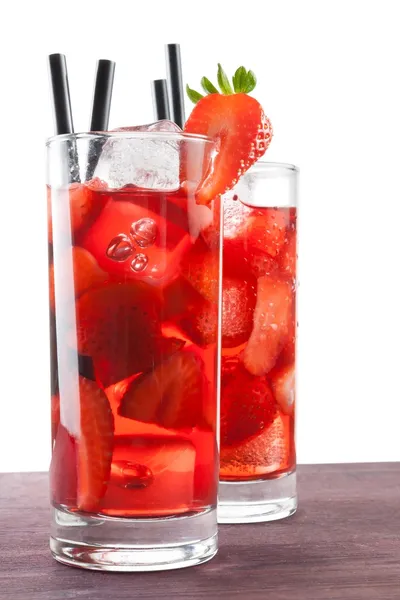 Strawberry cocktail with ice on old wood table — Stock Photo, Image