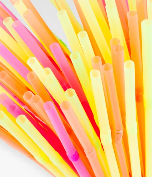 Drinking colorful straws — Stock Photo, Image