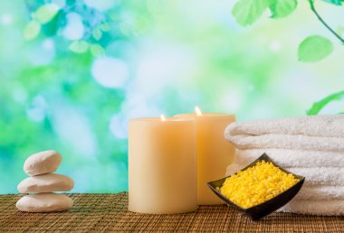 SPA масажу кордону фону з рушником діаграма з накопиченням, свічки і морської солі