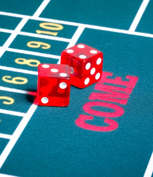 Two red dice on green gambling game — Stock Photo, Image