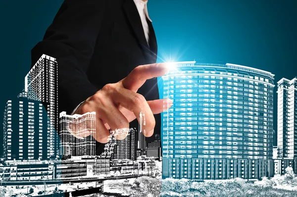 Business man or achitect touch the drawing of building or citysc — Stock Photo, Image