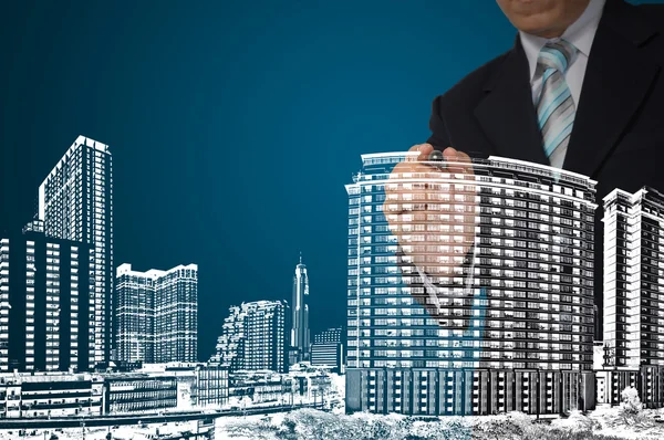 iş adamı çizmek cityscape ve İnşaat 
