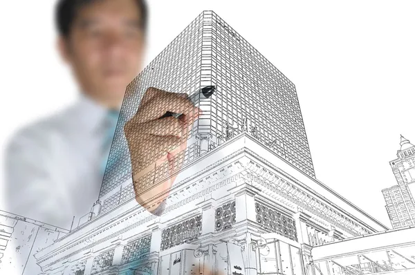 Businessman draw modern building and cityscape — Stock Photo, Image