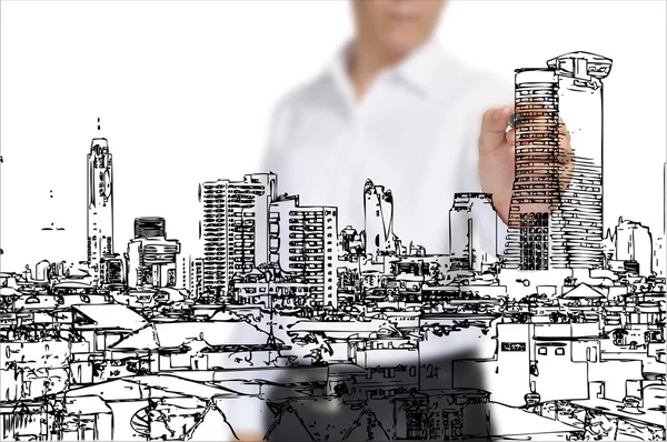 Affärsman som ritade byggnaden och stadsbild — Stockfoto