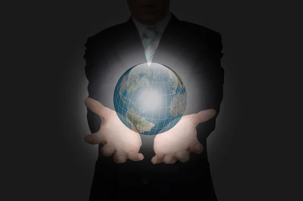 Hand van zakenman houden earth globe — Stockfoto