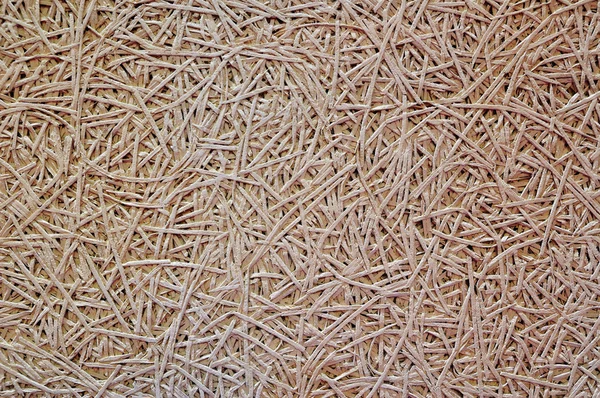 Achtergrond van de textuur van papier laag in de muur — Stockfoto