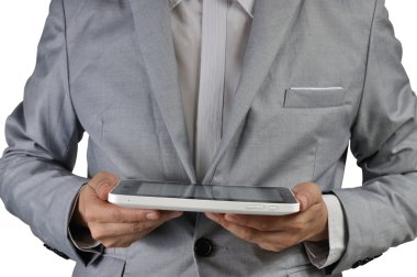 bir tablet dokunmatik bilgisayar gadget tutan işadamı 