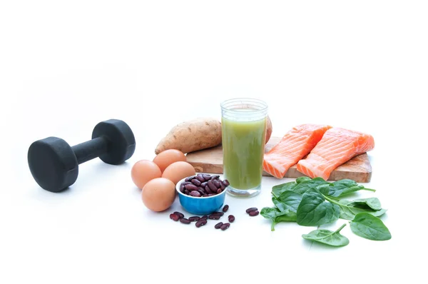 Alimentos proteicos y dumbell — Foto de Stock