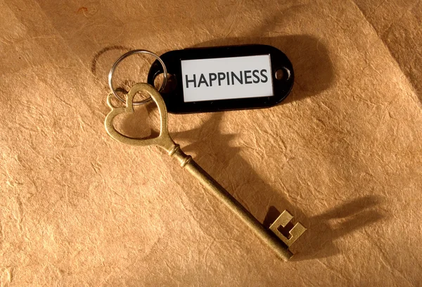 Ключ к счастью — стоковое фото