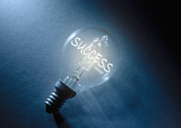 Success  inside light bulb — Stock Photo, Image