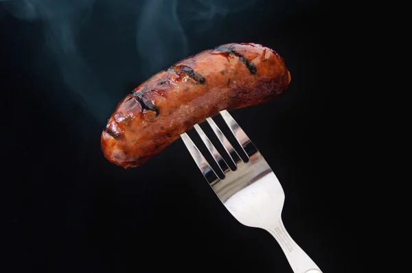 Salsiccia su una forchetta — Foto Stock
