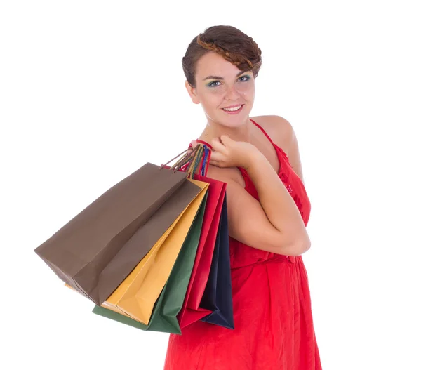 Kobieta niosąca torby na zakupy — Zdjęcie stockowe