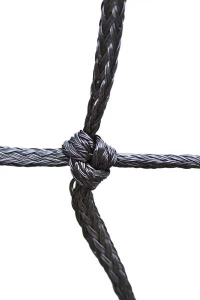 Strong knot tied by a black rope isolated on a white background — Stock Photo, Image