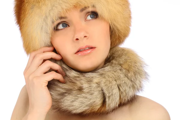 Close up portrait of young beautiful girl in fur hat over white background — Stock Photo, Image