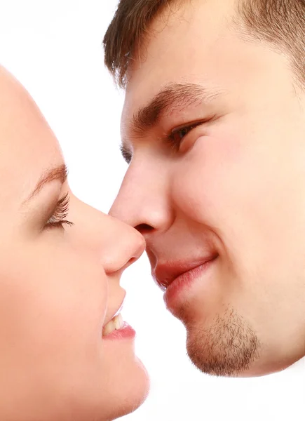 Close up portrait of young caucasian couple kissing — Stock Photo, Image