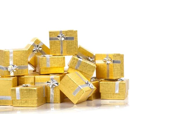 Pile of gold gift boxes — Stock Photo, Image