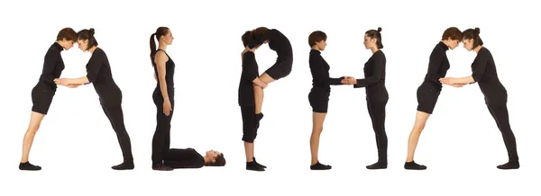 Black dressed people forming ALPHA word over white — Stock Photo, Image